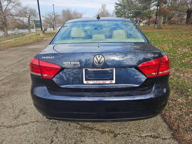 used 2014 Volkswagen Passat car, priced at $11,988