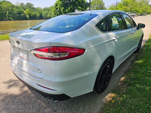used 2019 Ford Fusion car, priced at $16,988