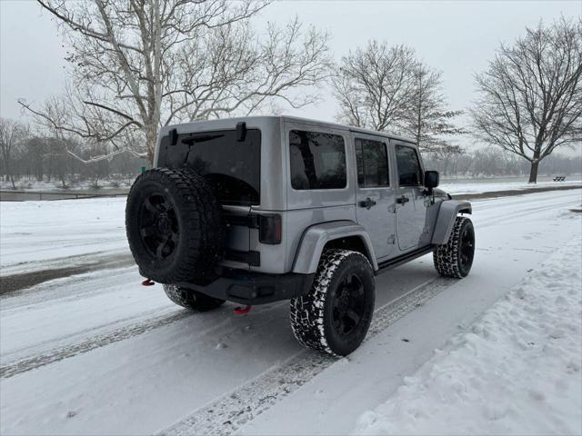 used 2013 Jeep Wrangler Unlimited car, priced at $21,988