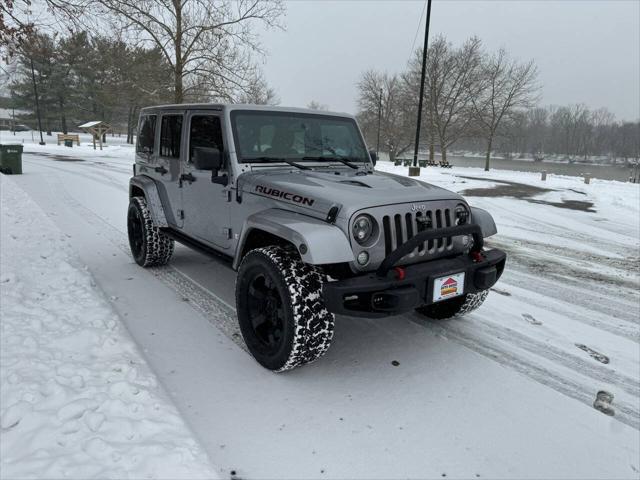 used 2013 Jeep Wrangler Unlimited car, priced at $21,988