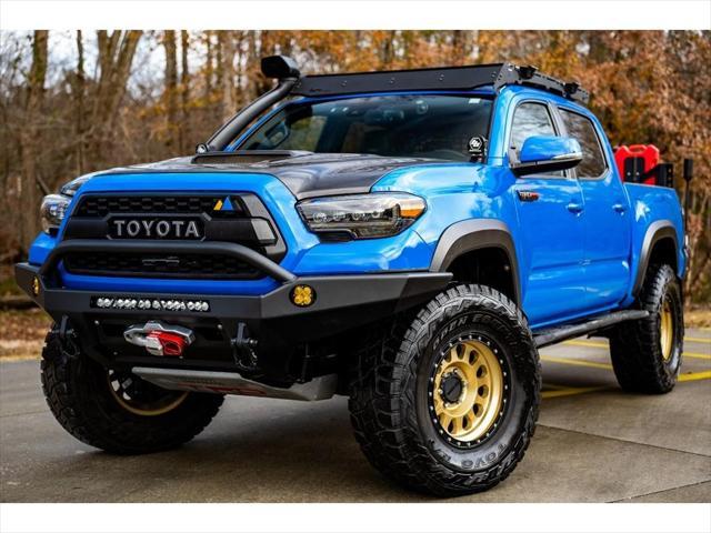 used 2019 Toyota Tacoma car, priced at $49,995