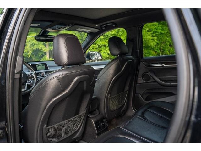 used 2018 BMW X1 car, priced at $13,995