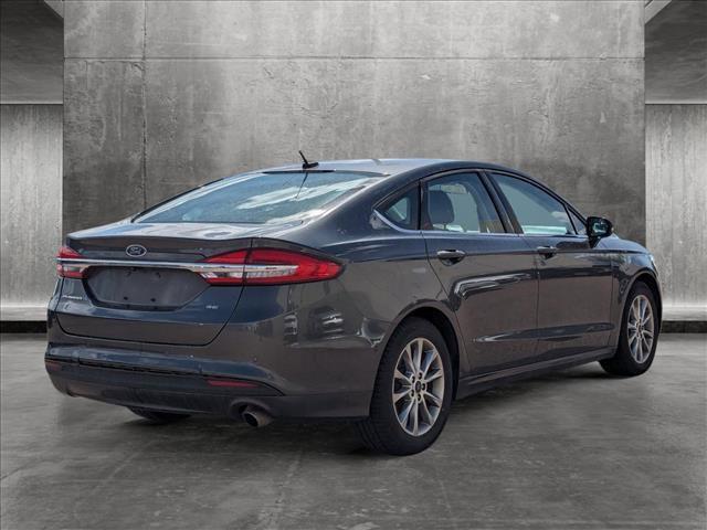 used 2017 Ford Fusion car, priced at $15,649