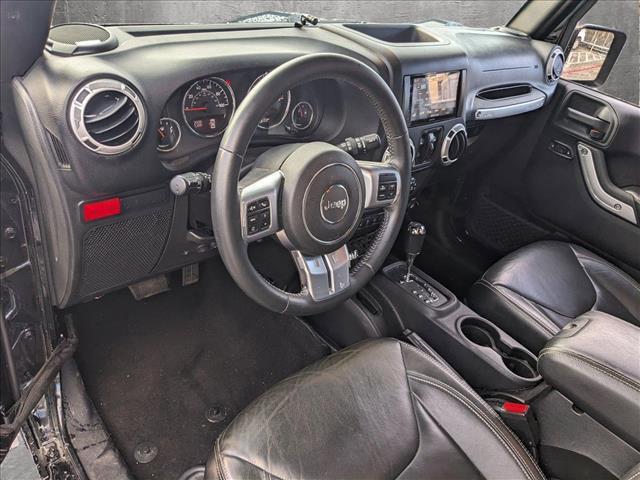 used 2015 Jeep Wrangler Unlimited car, priced at $23,379