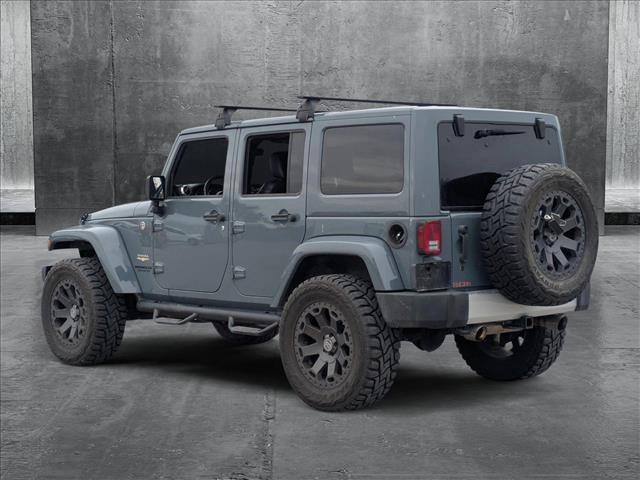 used 2014 Jeep Wrangler Unlimited car, priced at $21,997