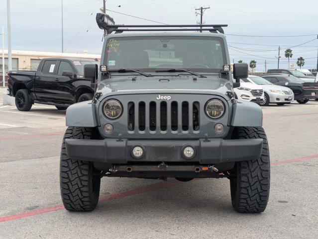 used 2014 Jeep Wrangler Unlimited car, priced at $21,997