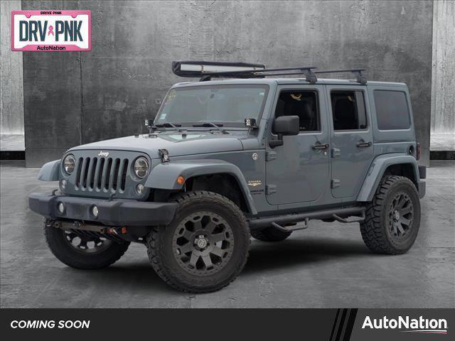 used 2014 Jeep Wrangler Unlimited car, priced at $21,997