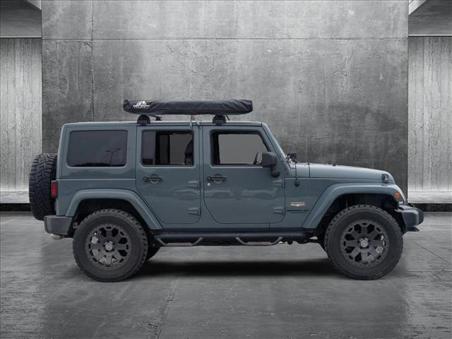 used 2014 Jeep Wrangler Unlimited car, priced at $21,997