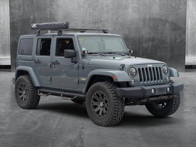 used 2014 Jeep Wrangler Unlimited car, priced at $21,997