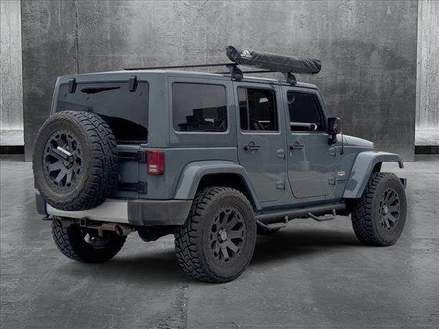 used 2014 Jeep Wrangler Unlimited car, priced at $21,997