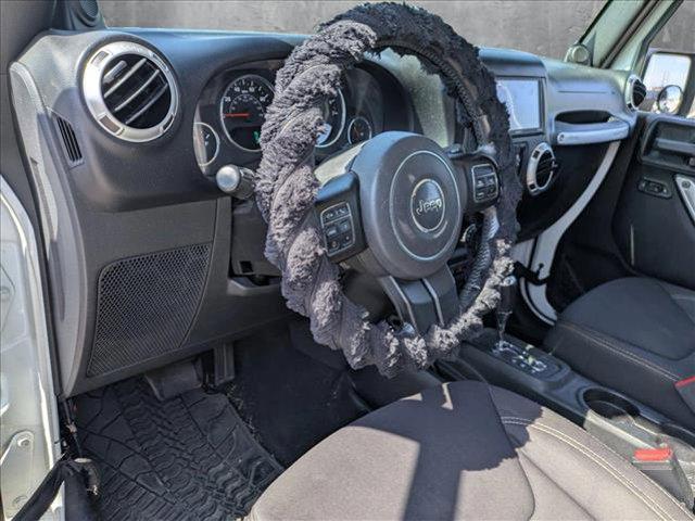 used 2013 Jeep Wrangler Unlimited car, priced at $14,949