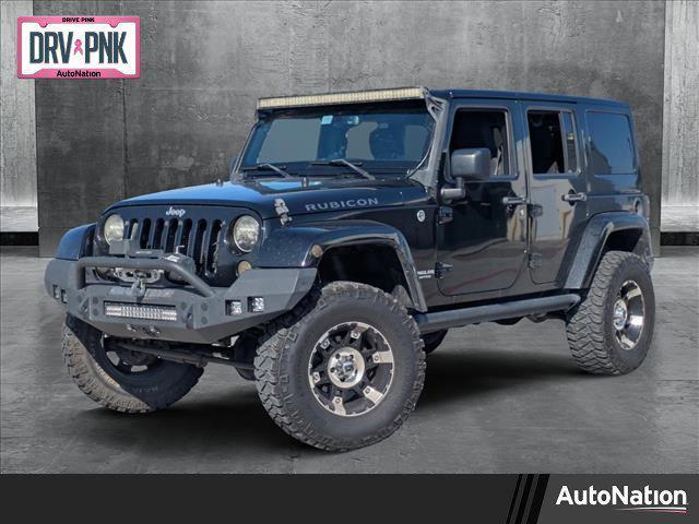 used 2015 Jeep Wrangler Unlimited car, priced at $20,996