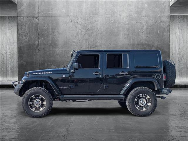 used 2015 Jeep Wrangler Unlimited car, priced at $21,299