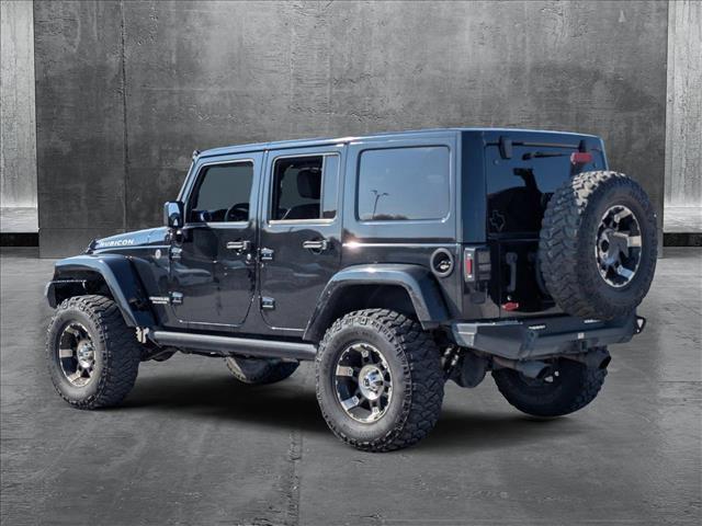 used 2015 Jeep Wrangler Unlimited car, priced at $21,299