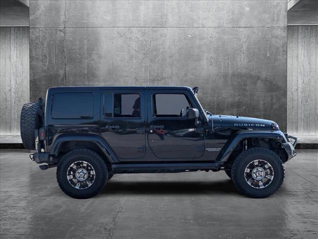 used 2015 Jeep Wrangler Unlimited car, priced at $21,299