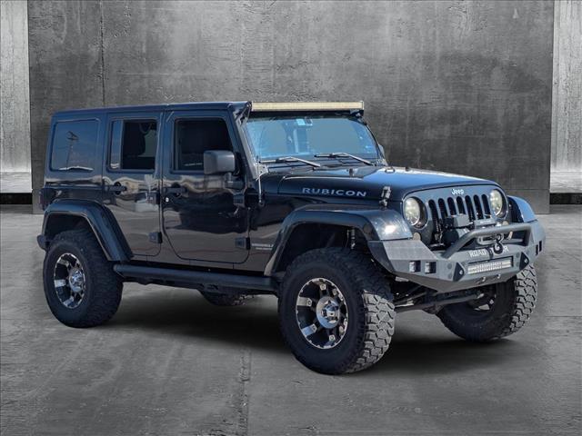 used 2015 Jeep Wrangler Unlimited car, priced at $21,299