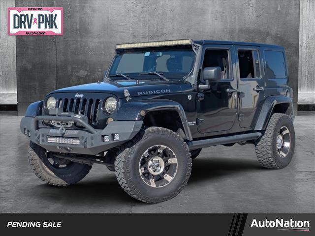 used 2015 Jeep Wrangler Unlimited car, priced at $21,299