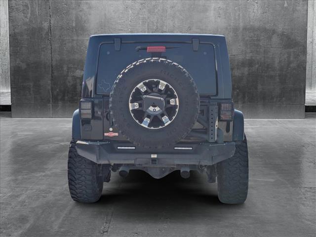 used 2015 Jeep Wrangler Unlimited car, priced at $21,299