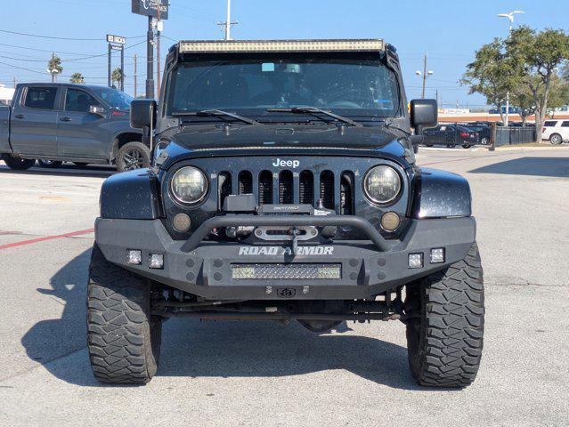 used 2015 Jeep Wrangler Unlimited car, priced at $21,299