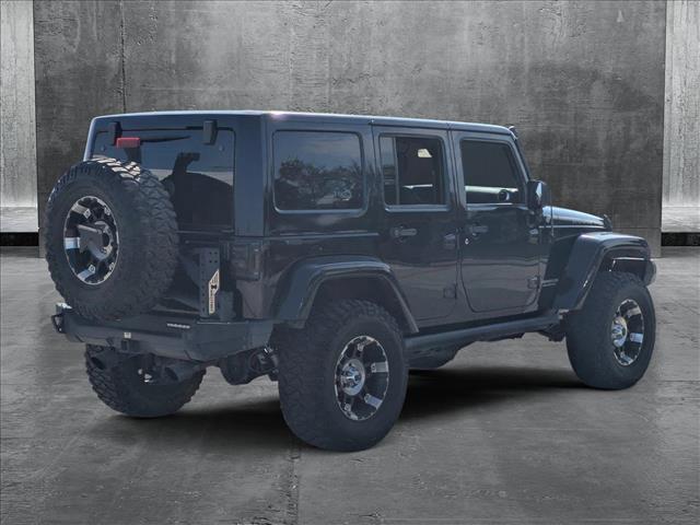 used 2015 Jeep Wrangler Unlimited car, priced at $21,299