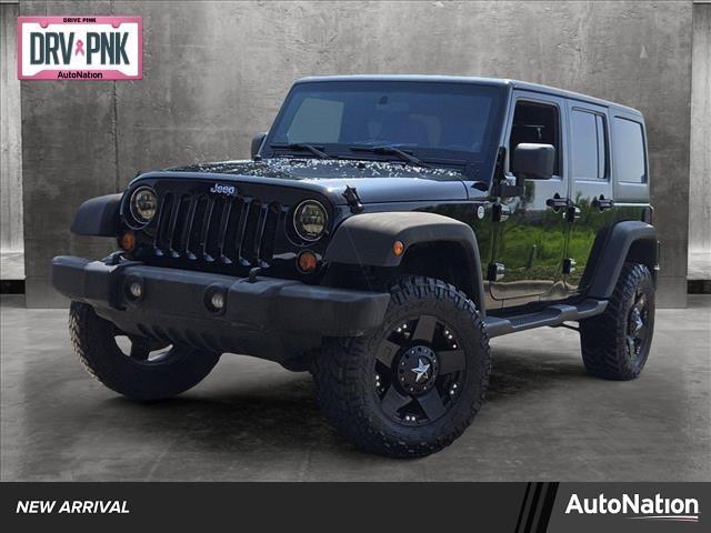 used 2011 Jeep Wrangler Unlimited car, priced at $16,987