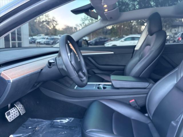 used 2023 Tesla Model 3 car, priced at $29,994