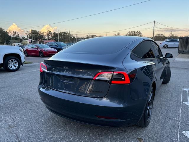 used 2023 Tesla Model 3 car, priced at $29,994