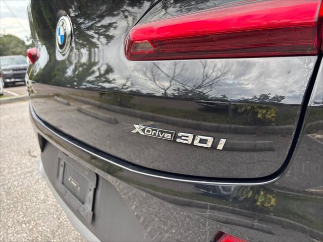used 2024 BMW X4 car, priced at $33,994