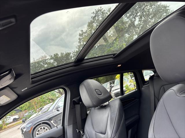 used 2024 BMW X4 car, priced at $33,994