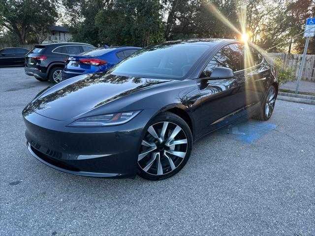 used 2024 Tesla Model 3 car, priced at $32,994