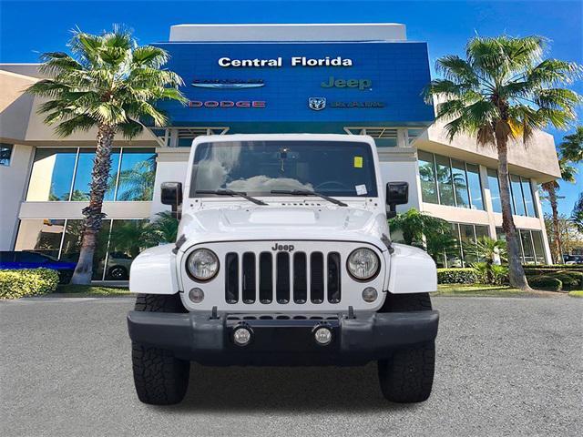 used 2015 Jeep Wrangler Unlimited car, priced at $16,499