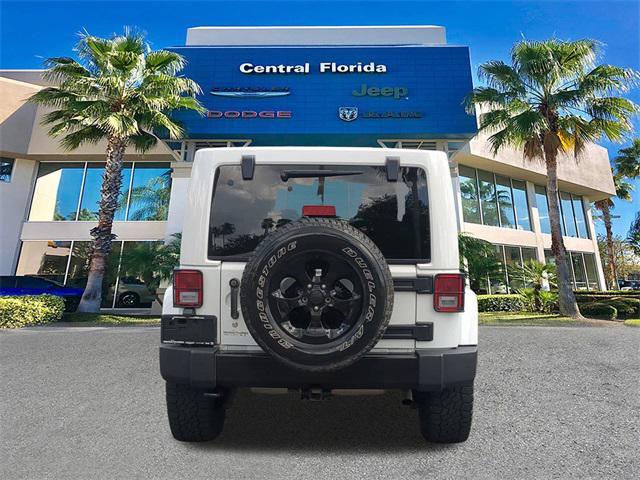 used 2015 Jeep Wrangler Unlimited car, priced at $16,499