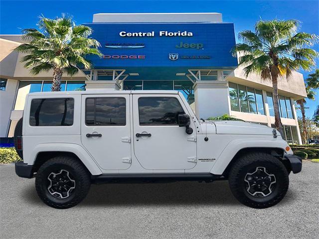 used 2015 Jeep Wrangler Unlimited car, priced at $16,499