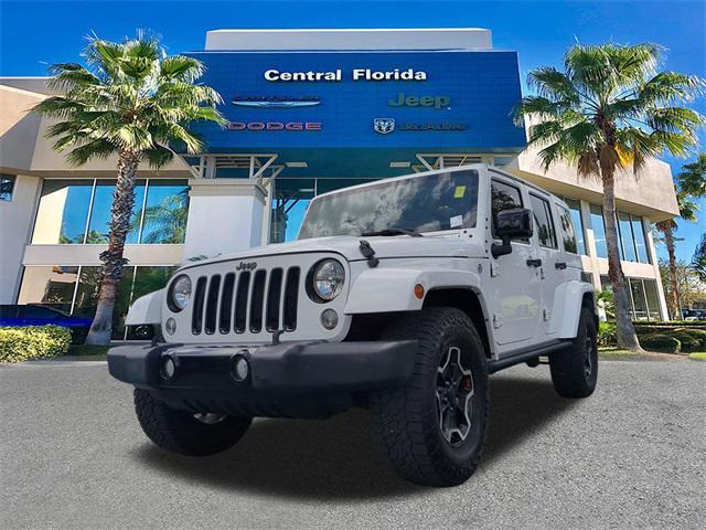 used 2015 Jeep Wrangler Unlimited car, priced at $16,499