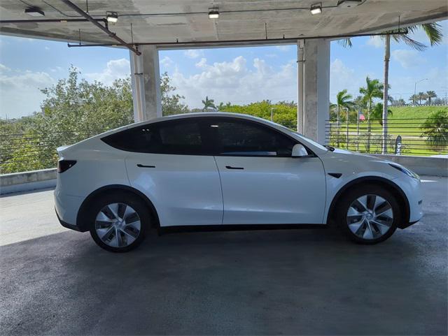 used 2023 Tesla Model Y car, priced at $34,499