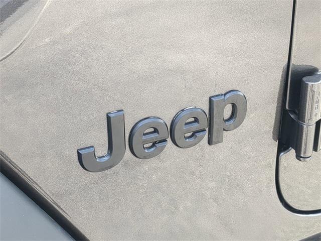used 2023 Jeep Wrangler car, priced at $29,499
