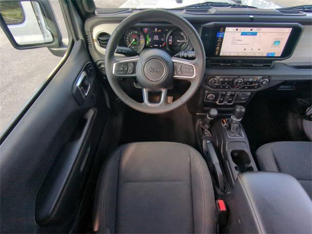 used 2024 Jeep Wrangler 4xe car, priced at $32,749