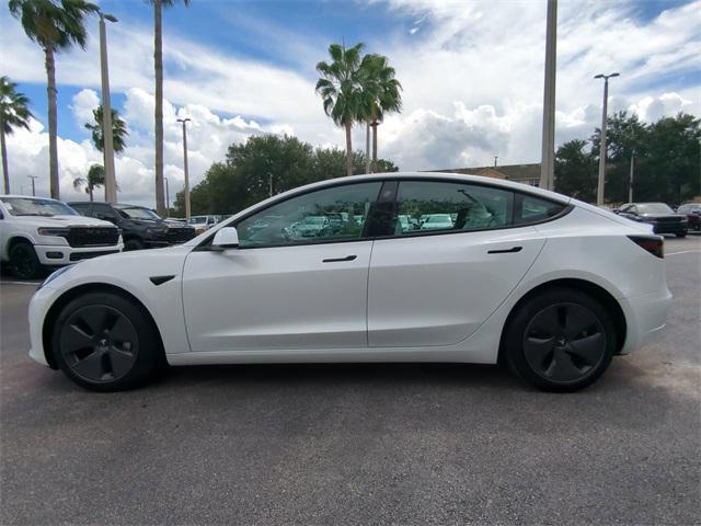 used 2023 Tesla Model 3 car, priced at $30,499