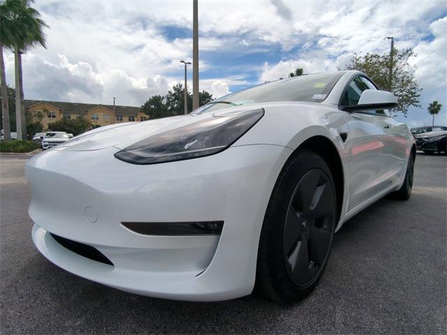 used 2023 Tesla Model 3 car, priced at $30,499