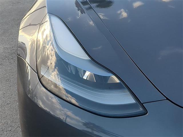 used 2023 Tesla Model 3 car, priced at $25,749