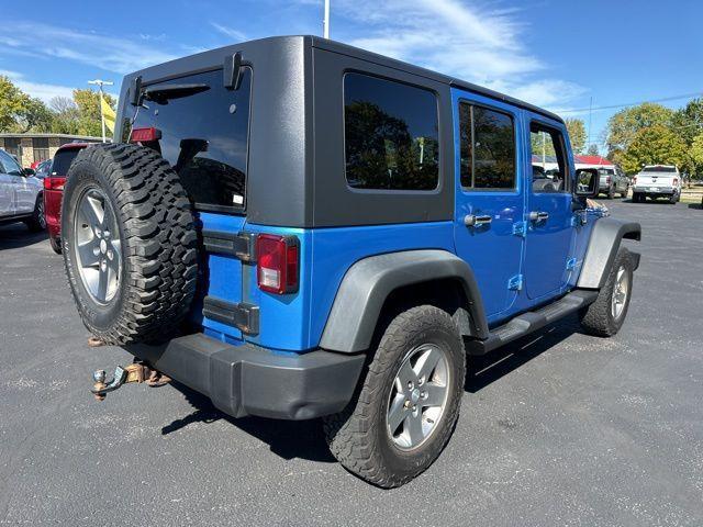 used 2010 Jeep Wrangler Unlimited car, priced at $9,994