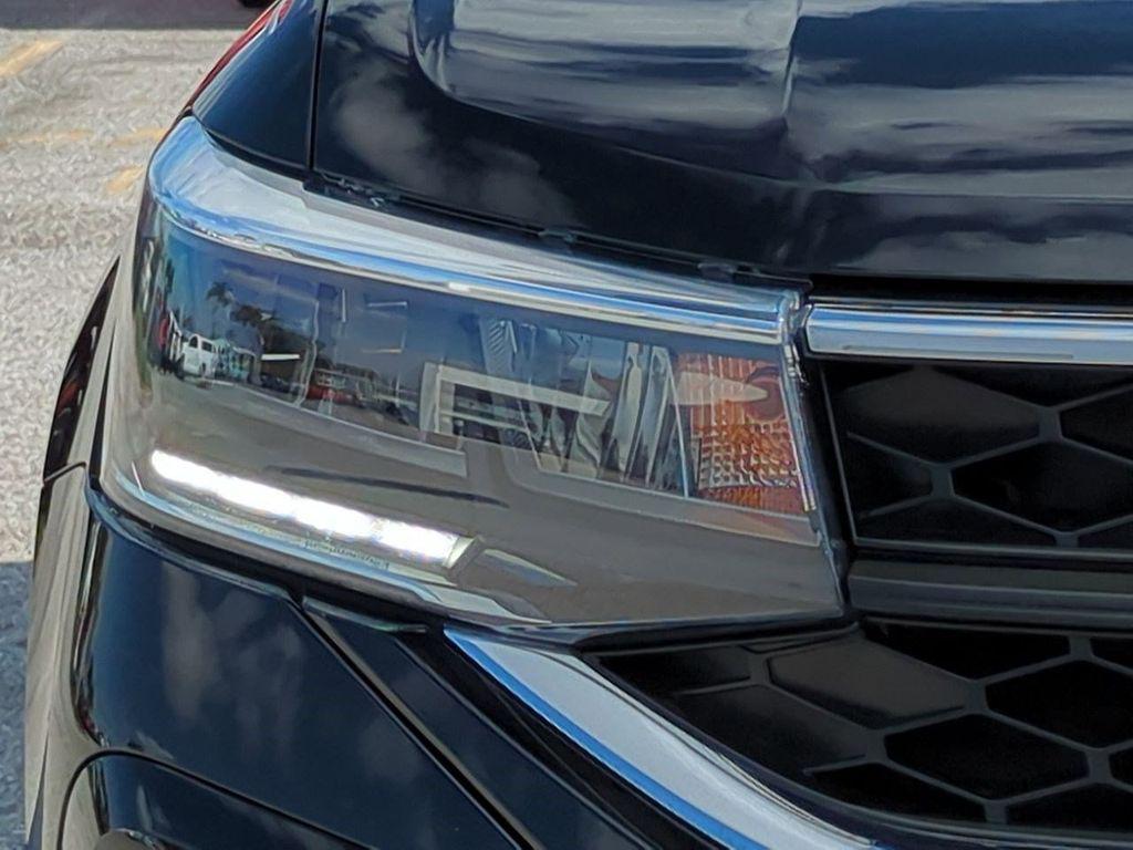 used 2023 Volkswagen Taos car, priced at $17,257