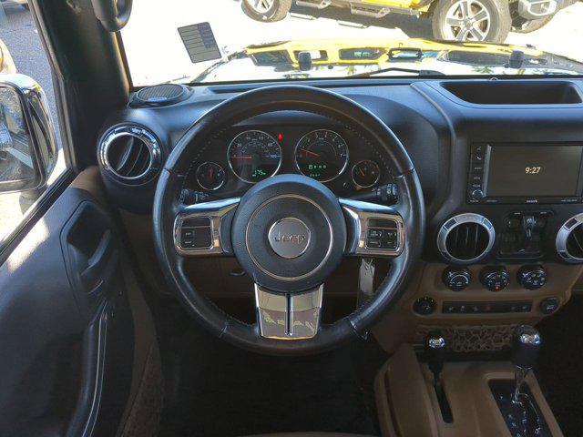 used 2015 Jeep Wrangler Unlimited car, priced at $18,591