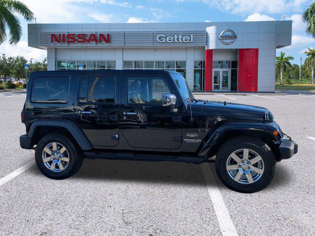 used 2015 Jeep Wrangler Unlimited car, priced at $18,591