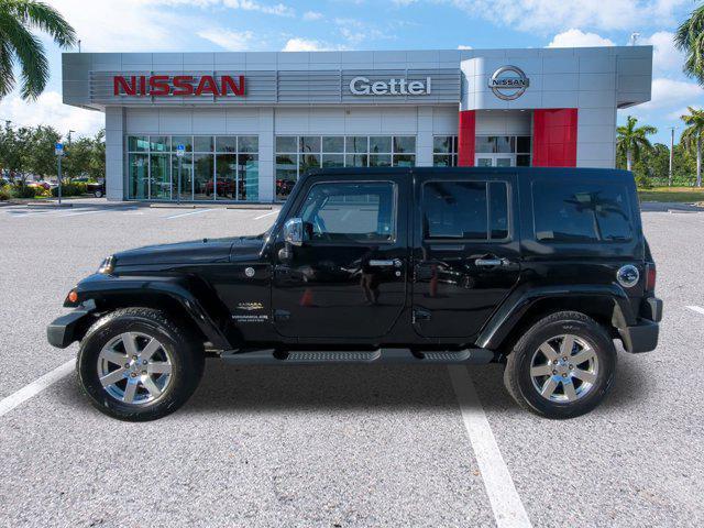 used 2015 Jeep Wrangler Unlimited car, priced at $18,591