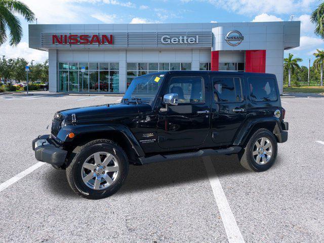 used 2015 Jeep Wrangler Unlimited car, priced at $18,591