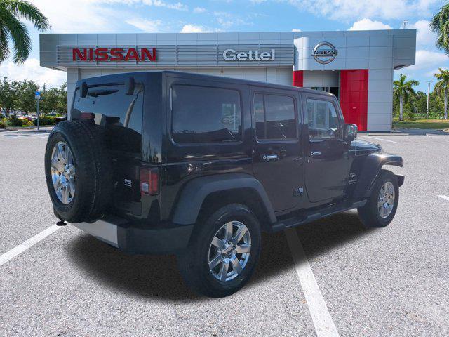 used 2015 Jeep Wrangler Unlimited car, priced at $18,591