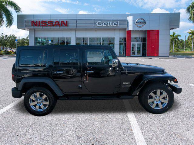 used 2015 Jeep Wrangler Unlimited car, priced at $18,591