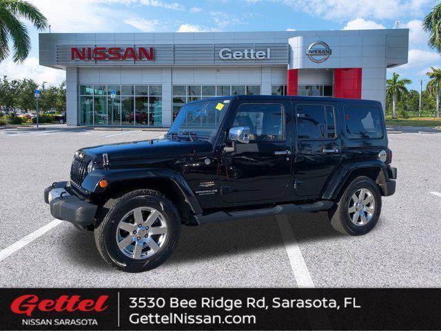 used 2015 Jeep Wrangler Unlimited car, priced at $18,591