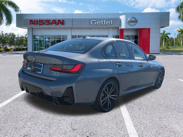 used 2023 BMW 330e car, priced at $32,191